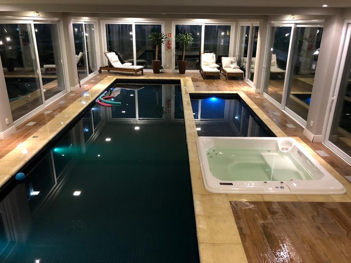Excelente apartamento em Gramado/RS no Condomínio Casa de Pedra Exterior foto