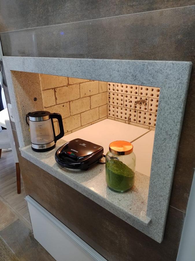 Excelente apartamento em Gramado/RS no Condomínio Casa de Pedra Exterior foto